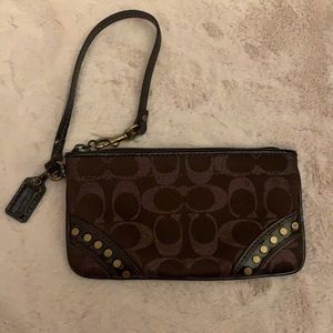 Coach Wristlet brown C’s with studs.